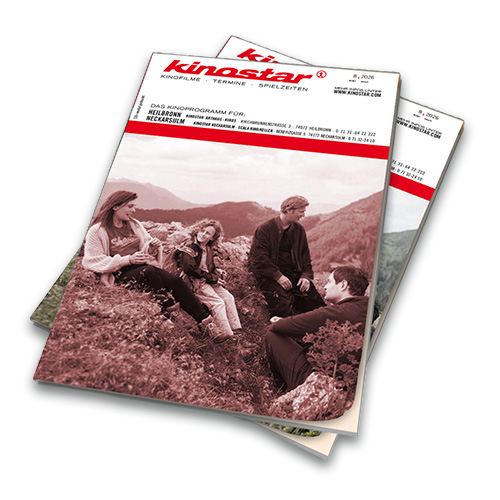 Aufgeschlagenes Kinostar-Programmheft mit Filmrolle